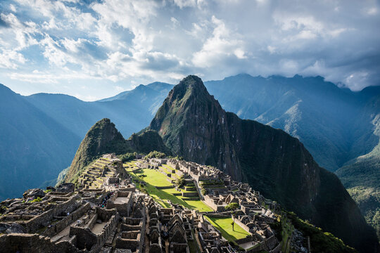 Machu Picchu, the Inca citadel high in the Andes, above the Sacred Valley, plateau with buildings and terraces.