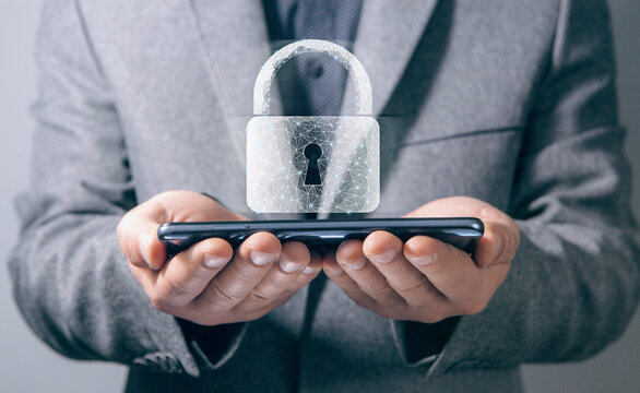 network lock. man holding phone