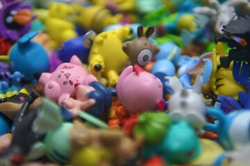 Fototapeta na wymiar Pile of Toys Plastic closeup