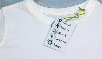 sustainable fashion icon on t shirt label with wear it, work it, love it, wash it, care for it,...