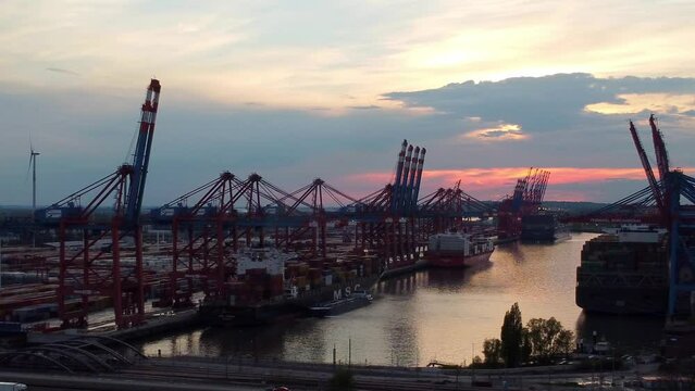 Port of Hamburg in the evening in the back light - aerial photography