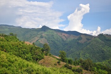 Fototapeta premium Mountain range scenery at road to Doi Sakat, Pua District, Nan Province, THAILAND.