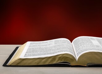 Obraz premium Christian Open Bible. The Bible. Reading The Word Of God. Study of religious literature.