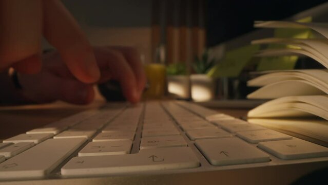  Slide camera over a keyboard.business writes important news