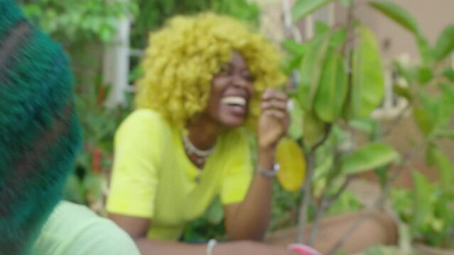 African women laughing outdoors