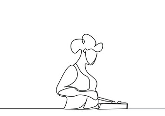 a chef housewife woman is preparing food in the kitchen with a knife in her hand