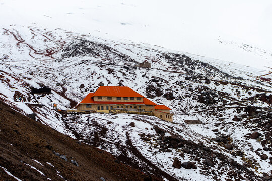 Refuge building located on the snowy slip of Cotopaxi volcano on altitud 4864 m above the sea level. Cotopaxi province, Ecuador