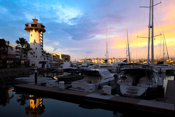 Mexico, Panoramic view of Marina and yacht club in Puerto Vallarta at sunset.