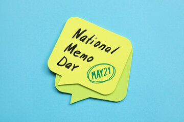 Sticky note with text NATIONAL MEMO DAY. MAY 21 on blue background