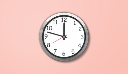 Wall clock set on pastel pink background. Plastic wall clock over pink background.
