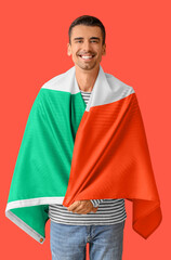 Fototapeta premium Young man with Italian flag on color background