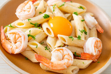 penne pasta white cream sauce with shrimps and egg