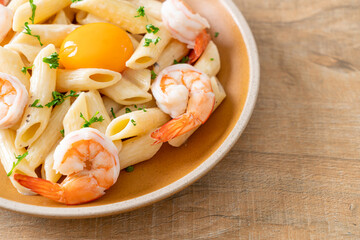 penne pasta white cream sauce with shrimps and egg