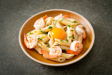 penne pasta white cream sauce with shrimps and egg