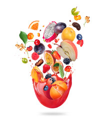 Various fruits and berries with splashes of juice isolated on a white background