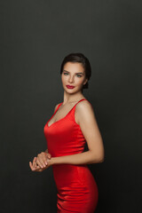 Fashionable beautiful woman in a red dress