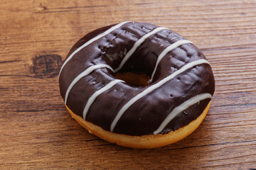 Glazed sweet tasty chocolate donut