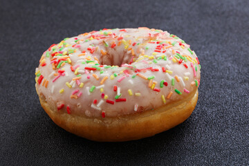 Sweet glazed vanilla donut with icing