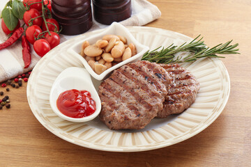 Grilled beef burger cutlet with sauce