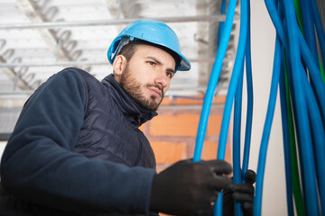 electrical worker wiring in building