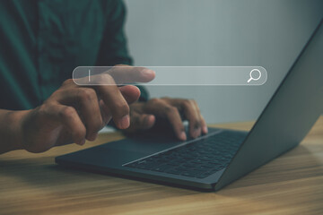 Data search technology search engine optimization with blank search bar, man hands working with laptop computer Searching  internet data information.
