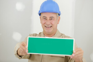 man and caution wet paint concept