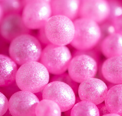 Small sweet pink balloons as a background.
