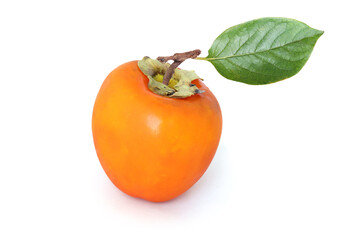 Persimmon with leaf  isolated on white background