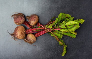 Now that looks delicious. High angle studio shot of delicious beetroots on a table.