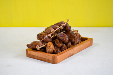 dried dates fruit in a bowl for ifthar ramadhan and ied fitr