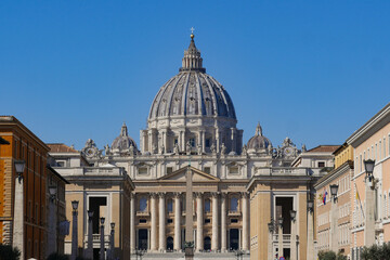 Fototapeta na wymiar Saint Peter's Square, Vatican.,Rome, 03.20.2021, Basilica of Saint Peter, The grandiose square in front of the main cathedral of Christendom and square, Colonnade Bernini, High quality photo