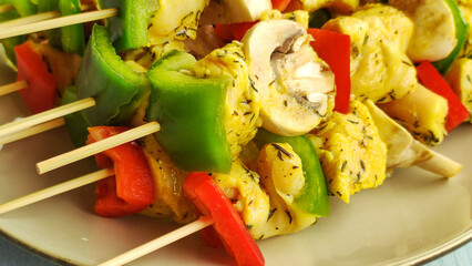 chicken skewer with mushrooms and raw peppers