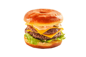 Double decker donut bun burger with beef patties and dressing.