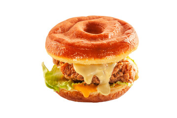 Donut burger bun with fried chicken patty melted cheese and dressing