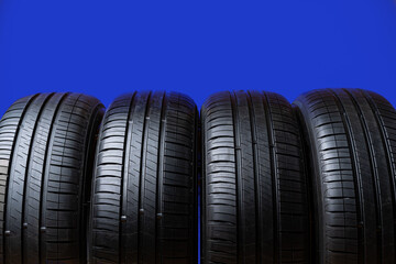 Obraz premium Group of tires on a blue background