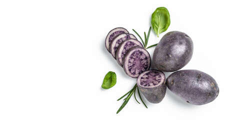 Raw cut purple sweet potatoes isolated on white background. Ipomoea batatas. Batata potato. Long banner format. top view