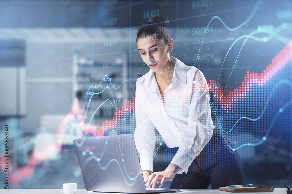 Poster attractive young white businesswoman using laptop at desktop with abstract red forex chart index on 