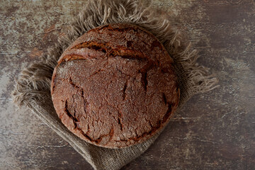 bread  on napkin on wooden background