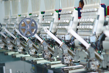 knitting machine in a factory mass scale production