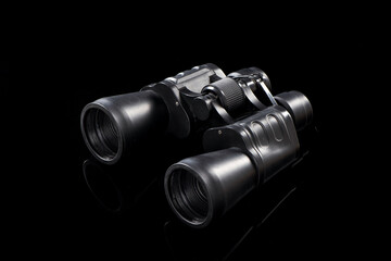 Binoculars isolated on black background