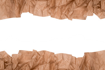 Obraz premium Horizontal frame made with kraft wrapped paper or baking parchment isolated on white background with copy space. Sustainable packaging concept, selective focus