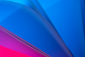 colorful abstract wallpaper texture. background macro of origami pattern made of curved sheets of paper.
