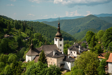Fototapeta na wymiar Beautiful historic church in the Spania Dolina village. Slovakia, Europe. 