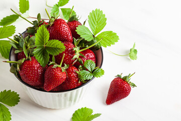 Strawberries with leaves.