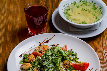 Breakfast including compote, salad, soup