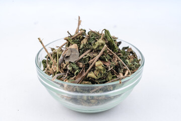 Dry Tulsi - holy Basil Dried (Ocimum sanctum) Top view over isolated white background