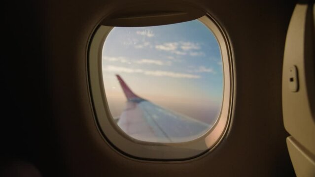 Airplane window frame during flying