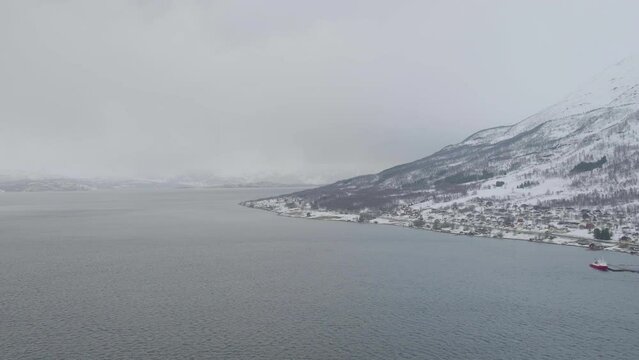 Foggy Scenery In Kafjord With Beautiful Snowy Mountains And Calm Sea Views - aerial shot