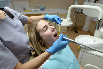 The process of dental treatment in a dental clinic.