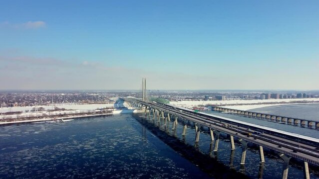 Drone shot of Champlain Bridge, Montreal, Canada during winter.